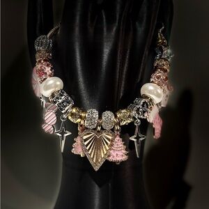 Elegant Gold and Silver Charm Bracelet